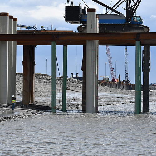 The PCT bridge and platform decking are supported by 123 precast concrete panels and 71 permanent piles.