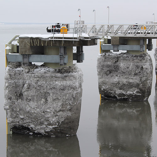 Three satellite mooring locations covered in ice are ready to secure vessels at the PCT.